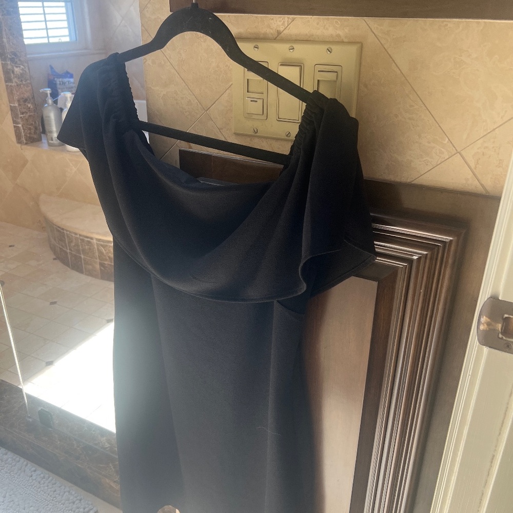 Beautiful lined black dress - casual or dressy. Off shoulder